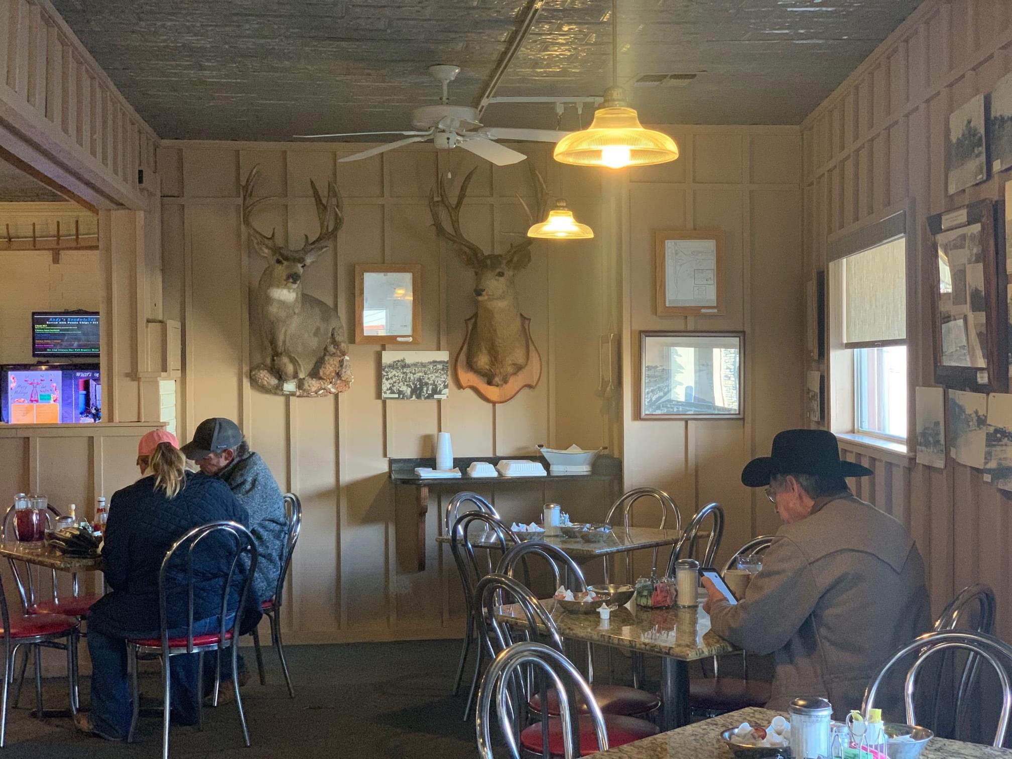 dining room with mounted bucks